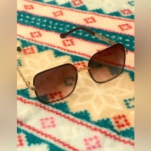 unknown brand sunglasses, pinkish tint